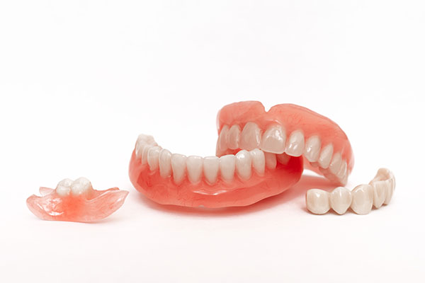 Denture Care: How to Properly Remove Your Dentures from Thanasas Family Dental Care in Troy, MI