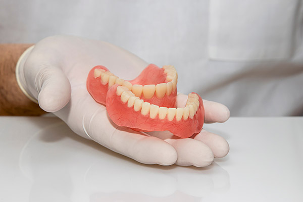 How to Properly Care for Your Dentures from Thanasas Family Dental Care in Troy, MI